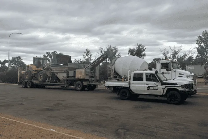 Mobile batch plant on a trailer with an agitator truck and a WA Concrete ute